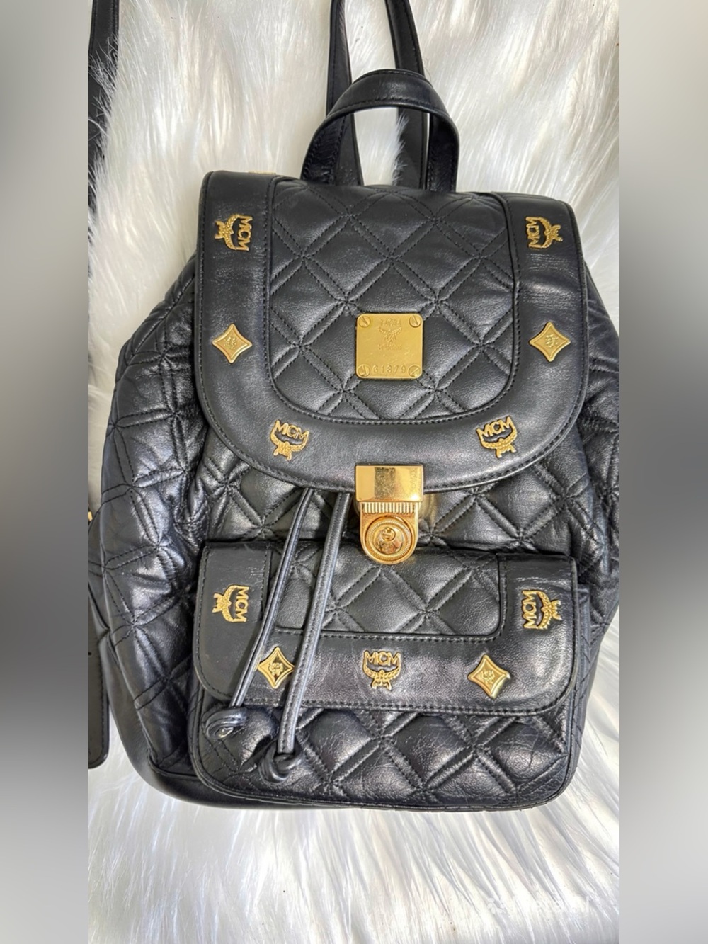 MCM Black Quilted Leather Backpack with Gold Accents
